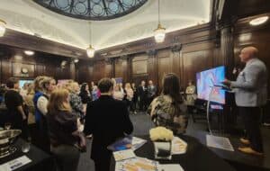 Photo of Keith Reed welcoming guests to the National PAIR Framework Launch event